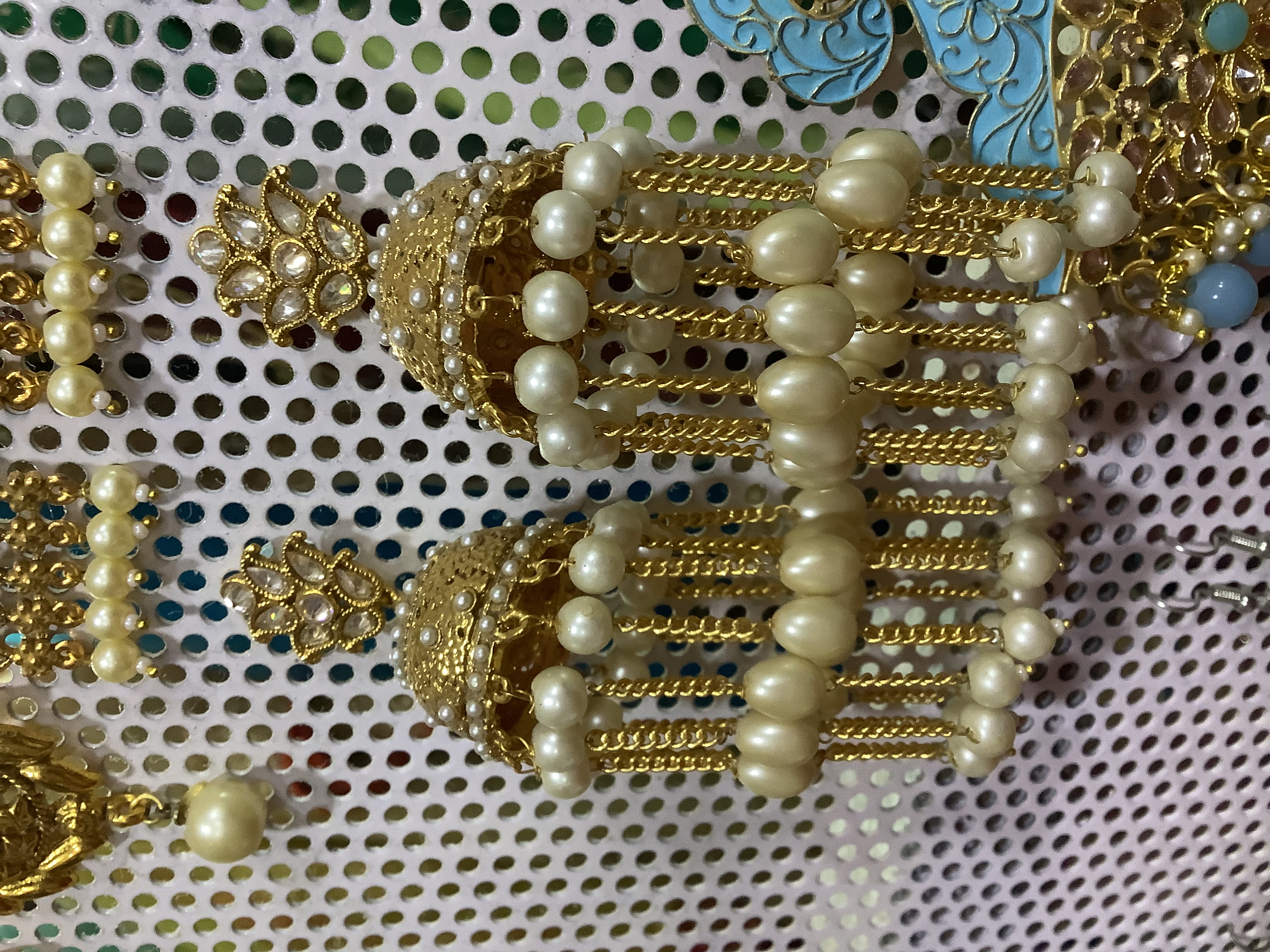 Golden long moti chain earrings 