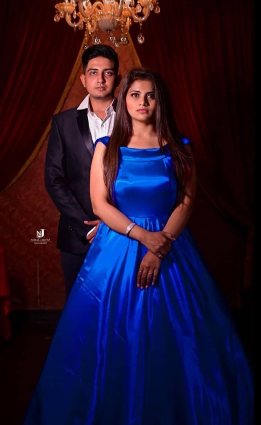 Blue satin trail gown