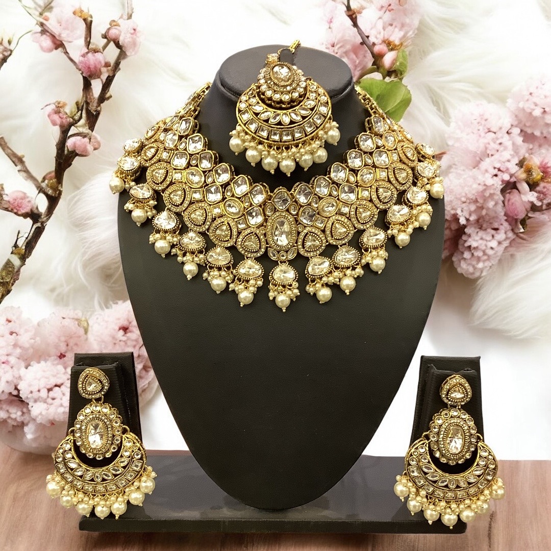 White kundan set