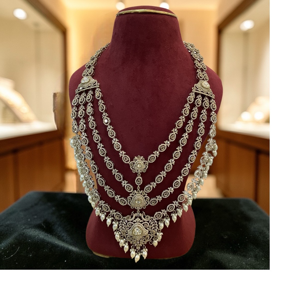 White kundan long set 